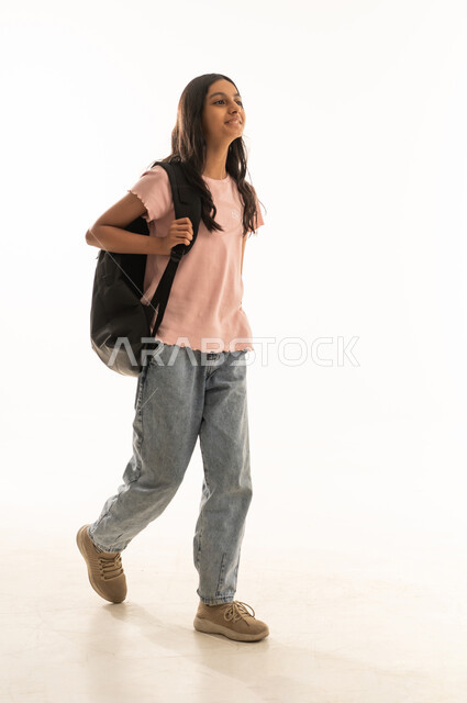 Saudi Girl Student with Backpack Walking on White Background