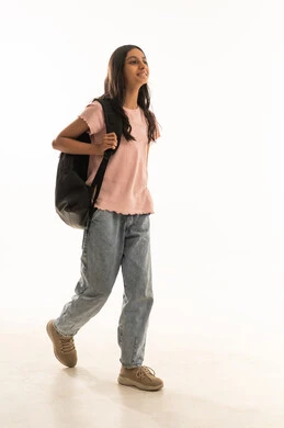 Saudi Girl Student with Backpack Walking on White Background