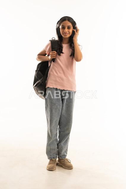 Saudi Girl with Headphones and School Backpack