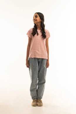 Omani Girl in Casual Wear Standing in Studio