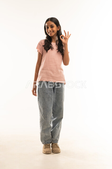 Omani Girl Making Okay Hand Gesture in Studio