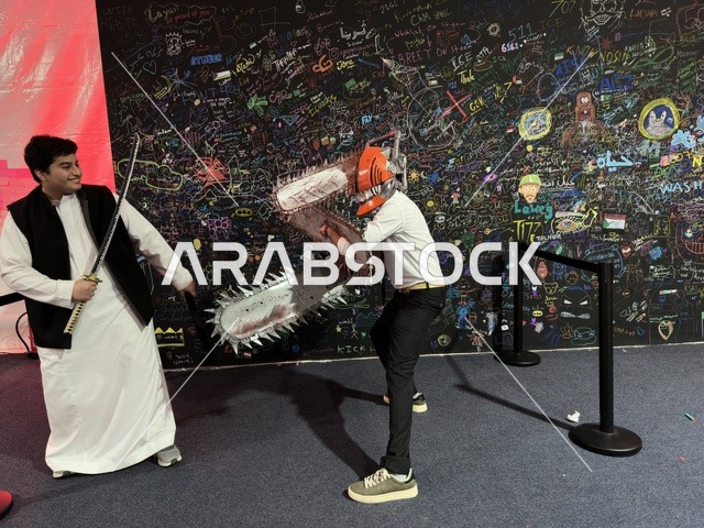 A man wearing a costume at the Gaming Plus (+) event at King Fahd University of Petroleum and Minerals in Dhahran, Eastern Province, Saudi Arabia, on January 28, 2026, a digital entertainment experience dedicated to video game enthusiasts, featuring game competitions and challenges, modern devices and technologies, wide youth participation, and an exciting atmosphere that combines entertainment and technology.