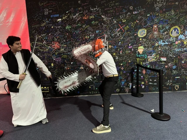 A man wearing a costume at the Gaming Plus (+) event at King Fahd University of Petroleum and Minerals in Dhahran, Eastern Province, Saudi Arabia, on January 28, 2026, a digital entertainment experience dedicated to video game enthusiasts, featuring game competitions and challenges, modern devices and technologies, wide youth participation, and an exciting atmosphere that combines entertainment and technology.