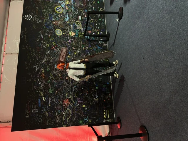 A man wearing a costume at the Gaming Plus (+) event at King Fahd University of Petroleum and Minerals in Dhahran, Eastern Province, Saudi Arabia, on January 28, 2026, a digital entertainment experience dedicated to video game enthusiasts, featuring game competitions and challenges, modern devices and technologies, wide youth participation, and an exciting atmosphere that combines entertainment and technology.