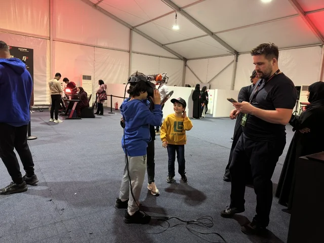 Wearing VR glasses at the Gaming Plus (+) event at King Fahd University of Petroleum and Minerals in Dhahran, Eastern Province, Saudi Arabia, on January 28, 2026, with competitions and gaming challenges, a digital entertainment experience dedicated to video game enthusiasts, wide youth participation, modern devices and technologies, and an exciting atmosphere that combines entertainment and technology.