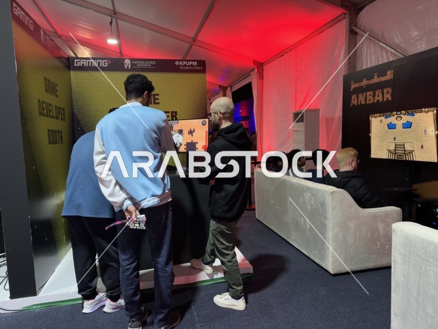 A digital entertainment experience dedicated to electronic gaming enthusiasts, the Gaming Plus (+) event at King Fahd University of Petroleum and Minerals in Dhahran, Eastern Province, Saudi Arabia, on January 28, 2026, featuring game competitions and challenges, modern devices and technologies, wide youth participation, and an exciting atmosphere that combines entertainment and technology.