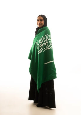 Saudi Woman with National Flag on White Background