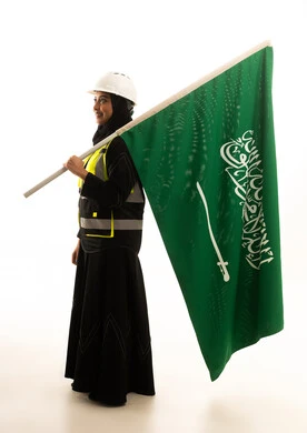 Saudi Female Engineer with National Flag in Studio