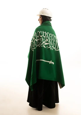 Saudi Female Engineer with National Flag and Hard Hat