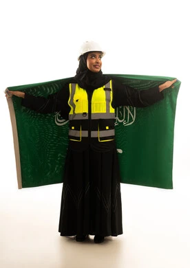 Saudi Female Engineer Holding Flag on White Background