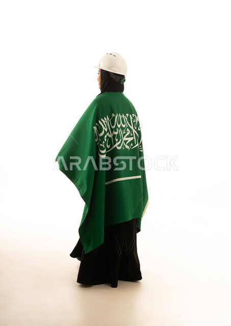 Saudi Female Engineer in Hard Hat with National Flag