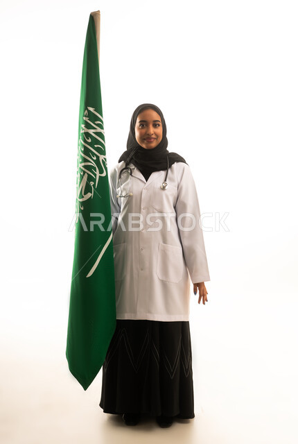 Saudi Female Doctor Holding National Flag White Background