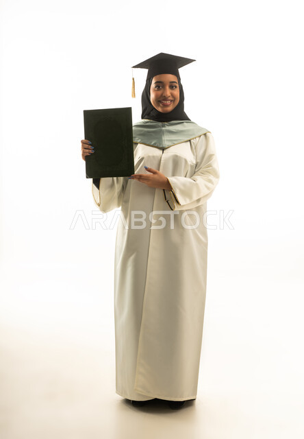 Saudi Female Graduate Holding Diploma on White Background