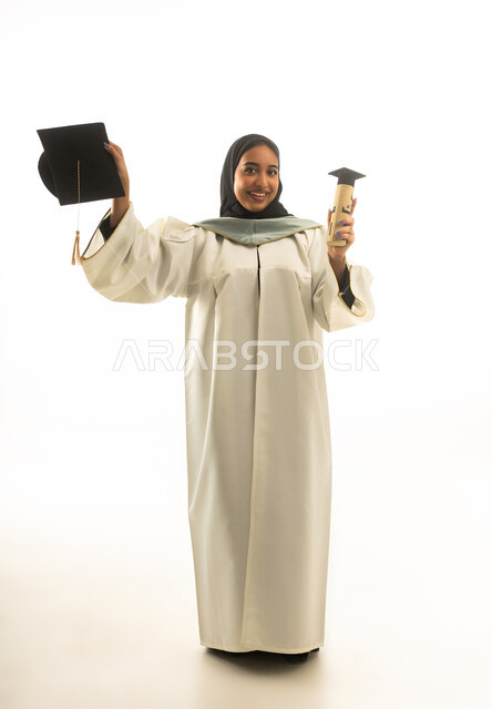Saudi Female Graduate with Diploma and Cap