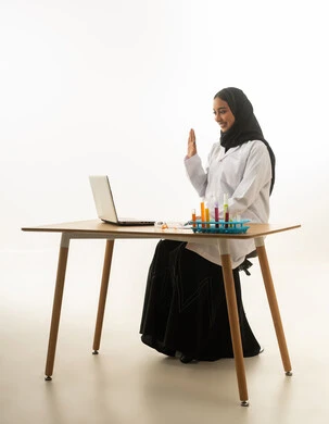 Saudi Female Scientist on Laptop Video Call