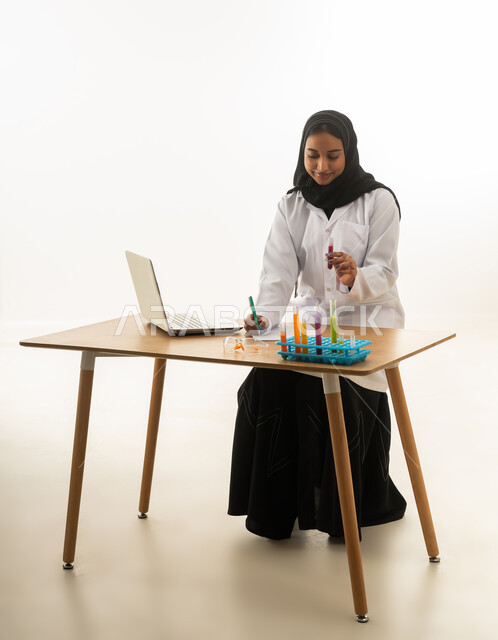 Saudi Female Scientist Researching in Modern Laboratory