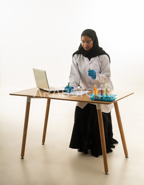 Saudi Female Scientist Working in Laboratory