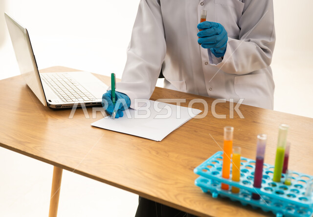 Scientist in Lab Coat Writing Research Data