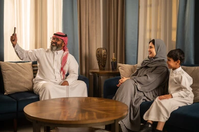 Saudi Family Taking Selfie in Traditional Dress