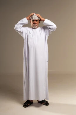 Omani Man in Traditional Dishdasha Studio Portrait