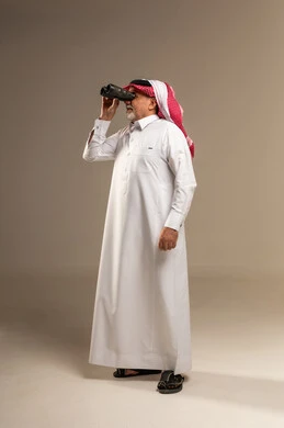 Elderly Saudi Man with Binoculars in Studio