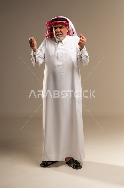 Senior Saudi Man Expressing Frustration in Thobe