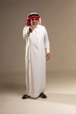 Senior Saudi Man Pointing Finger in Studio