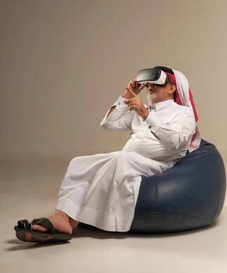 Senior Saudi Man Using Virtual Reality Headset