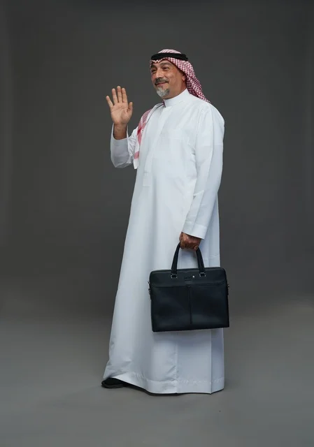 A Saudi Arabian Gulf businessman wearing a white thobe and a shemagh, carrying a laptop bag, with various gestures and signals, full body, gray background.
