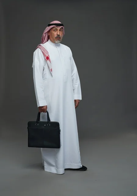 A Saudi Arabian Gulf businessman wearing a white thobe and a shemagh, carrying a laptop bag, with various gestures and signals, full body, gray background.