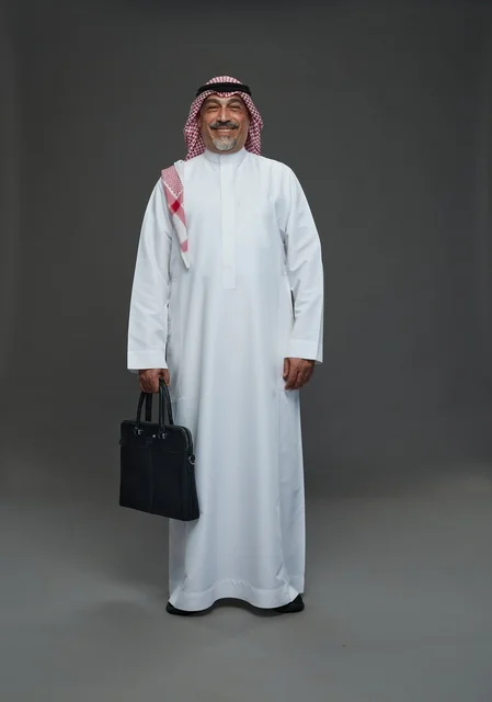 A Saudi Arabian Gulf businessman wearing a white thobe and a shemagh, carrying a laptop bag, with various gestures and signals, full body, gray background.