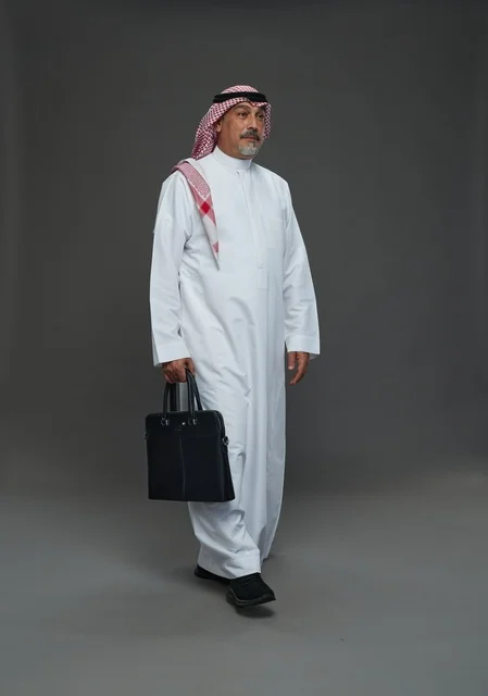 A Saudi Arabian Gulf businessman wearing a white thobe and a shemagh, carrying a laptop bag, with various gestures and signals, full body, gray background.