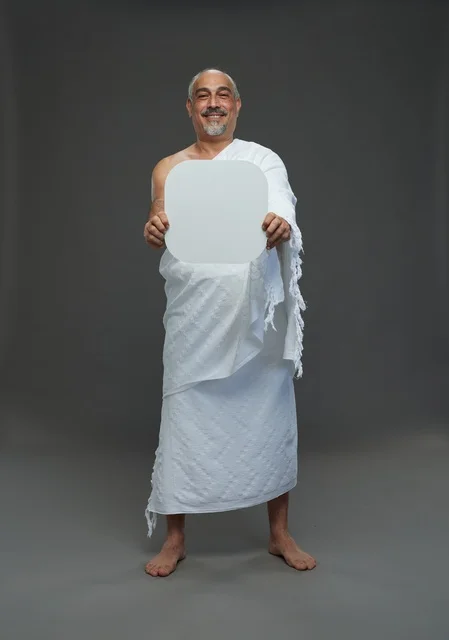 A portrait of a Saudi pilgrim in Ihram clothing holding a blank white square board while performing the rituals, with various gestures and signs, full body, gray background.