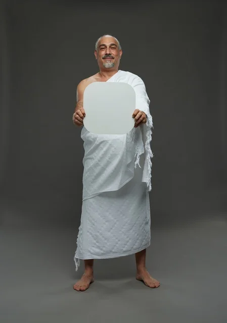 A portrait of a Saudi pilgrim in Ihram clothing holding a blank white square board while performing the rituals, with various gestures and signs, full body, gray background.