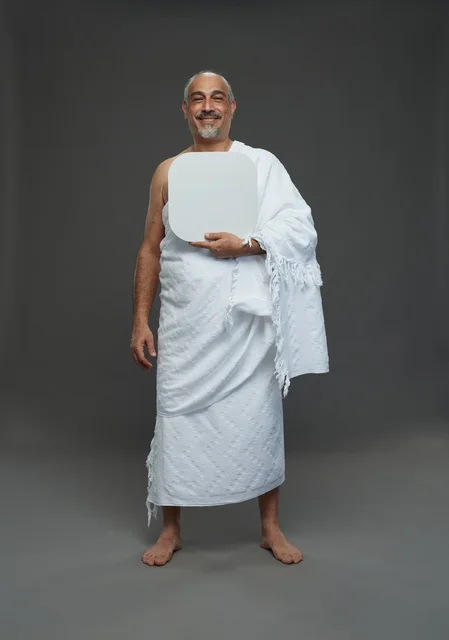 A portrait of a Saudi pilgrim in Ihram clothing holding a blank white square board while performing the rituals, with various gestures and signs, full body, gray background.
