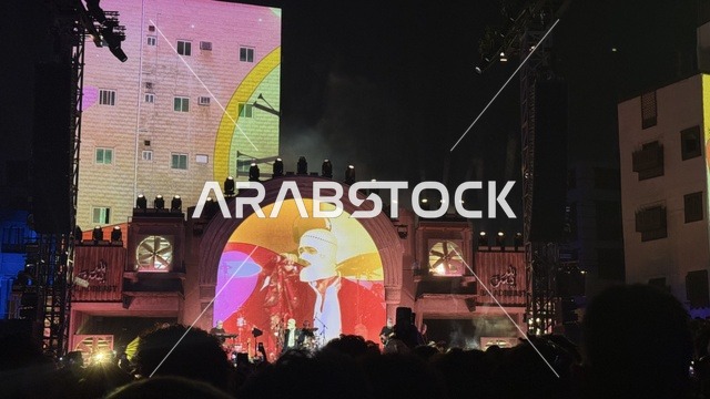 A musical performance at the Balad Beast event in the historic city of Jeddah, Saudi Arabia, a music and arts festival organized by MDL Beast on January 30, 2026, a contemporary artistic experience, a vibrant celebratory atmosphere, wide public interaction, music and art in the heart of Jeddah and close to the Red Sea coast.