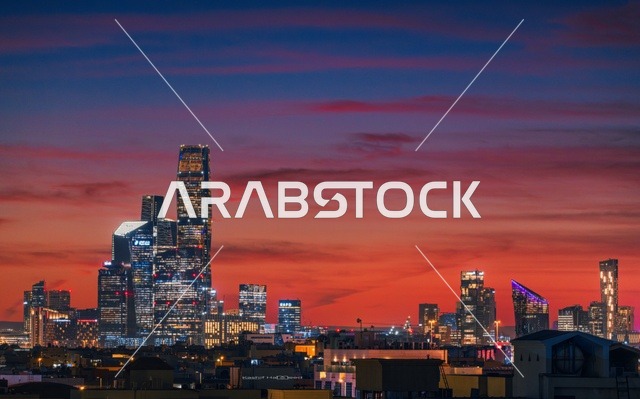 The skyline of Riyadh, a creative image of the sunset in the city of Riyadh in the Kingdom of Saudi Arabia, sunrise and sunset, architectural art in Saudi Arabia, towers and skyscrapers, famous landmarks of Riyadh, tourist attractions in Saudi Arabia.