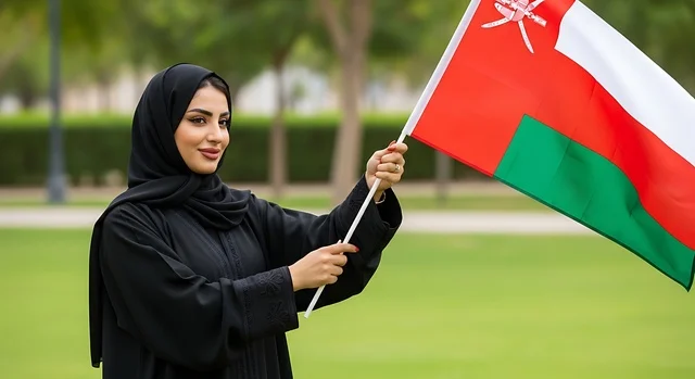 الاحتفال بالأعياد والمناسبات الوطنية, حب الوطن والانتماء إليه، إمرأة عربية خليجية عمانية ترتدي الحجاب والعباءة تمسك علم السلطنة، ذكرى اليوم الوطني العماني 18 نوفمبر، إحياء ذكرى تأسيس الدولة 1775 م، الاعتزاز والفخر بالرموز والراية