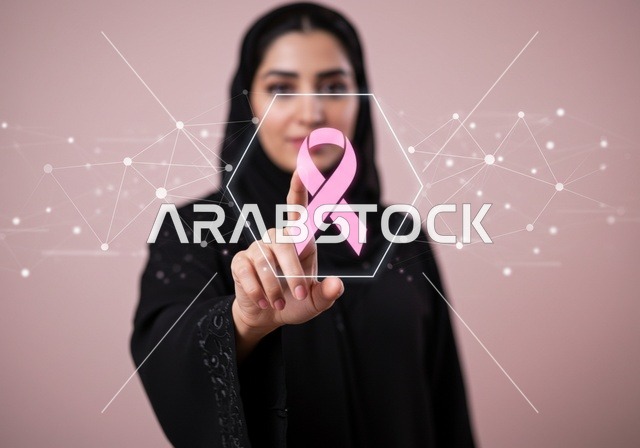 شعار الوعي بسرطان الثدي بتقنية الهولوجرام ، سيدة عربية خليجية سعودية ترتدي العباءه والحجاب ، الاهتمام بالمرض والكشف المبكر،تحدي الامراض الخبيثه، رمز الحملة العالمية النسائية، اليوم العالمي للتوعيه بالكشف عن سرطان الثدي