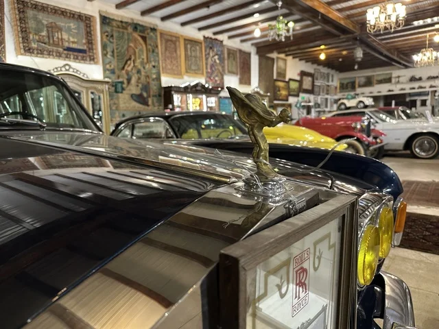 Classic vintage cars at the Al-Falwah and Al-Jawhara Museum in the Al-Nuzha neighborhood of Dammam, Eastern Province, Saudi Arabia, on February 21, 2018, a distinctive educational and tourist destination, documenting handicrafts and Saudi identity, a heritage and cultural landmark showcasing the history of traditional clothing and jewelry, Saudi heritage, Islamic art.