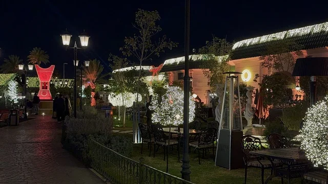 Seasonal events and entertainment experiences, The Groves in the Al-Rafiah neighborhood of Riyadh in 2026, Saudi Arabia, is a modern open entertainment destination, featuring green spaces and outdoor walkways, diverse restaurants and cafes, and an upscale family atmosphere that combines relaxation and social life.