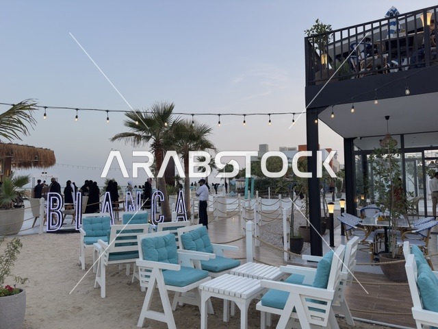 Unique family atmosphere at Takiya Bahr in the Eastern Province of Dammam on December 24, 2025, Saudi Arabia, with various entertainment shows and activities, a tourist and recreational seaside destination, upscale restaurants and cafes with a coastal view.