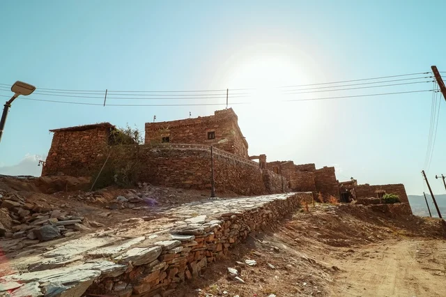 Al-Omran Al-Asiri, an old mud house in the Asir region, historical archaeological sites in the Kingdom of Saudi Arabia, mud bricks, ancient architecture.