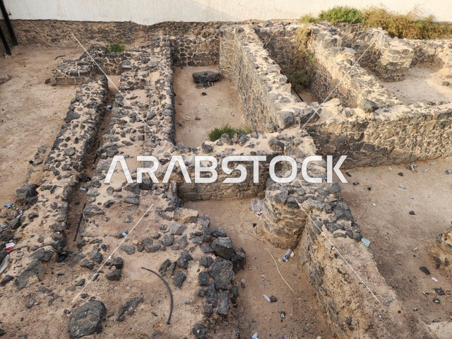 Exposed stone foundations at an excavation site, Kingdom of Saudi Arabia, Medina, Friday Mosque, one of the most prominent historical landmarks associated with the Prophet's biography, the first Friday prayer held after the migration, it was completely rebuilt and expanded during the reign of King Fahd.