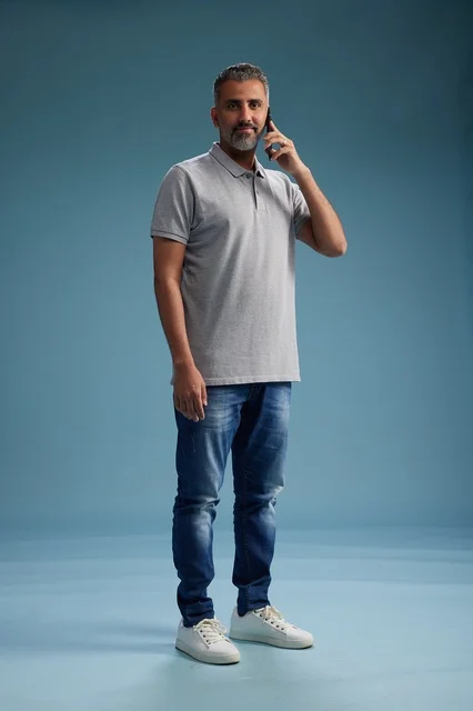 Saudi Man Talking on Mobile Phone in Studio