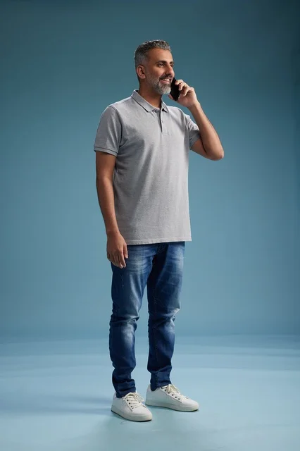 Saudi Man Talking on Mobile Phone in Studio