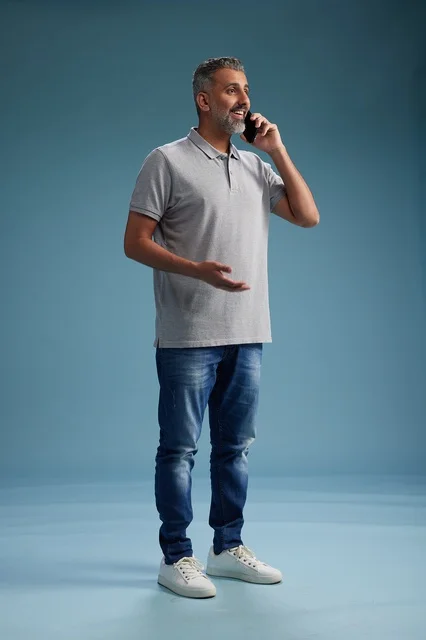 Saudi Man Talking on Mobile Phone in Studio