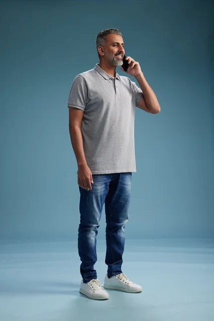 Saudi Man Talking on Mobile Phone in Studio