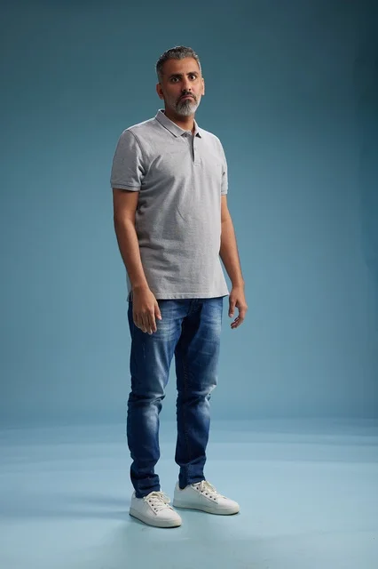 Saudi Man in Casual Clothes on Blue Background