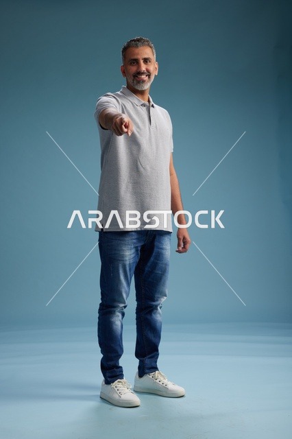 Saudi Man in Studio Pointing at Camera